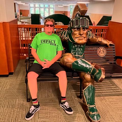 MSU alumni Daniel Patterson with Sparty